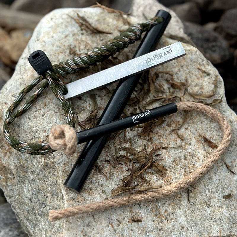 6-inch ferro rod on top of rocks.